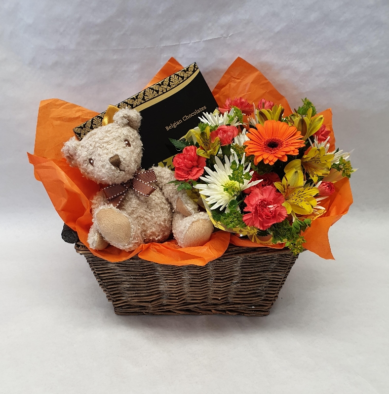 teddy bear and flowers gift